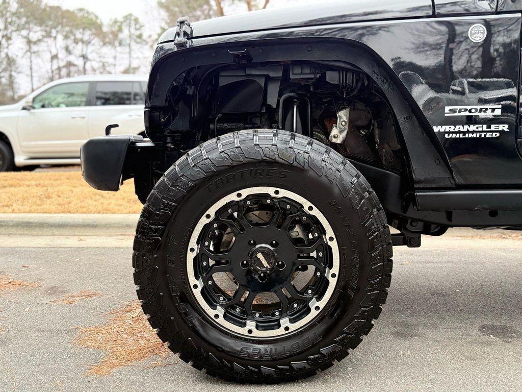 used 2013 Jeep Wrangler Unlimited car, priced at $13,995