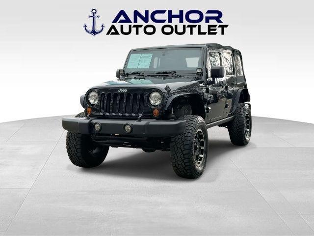 used 2013 Jeep Wrangler Unlimited car, priced at $13,995