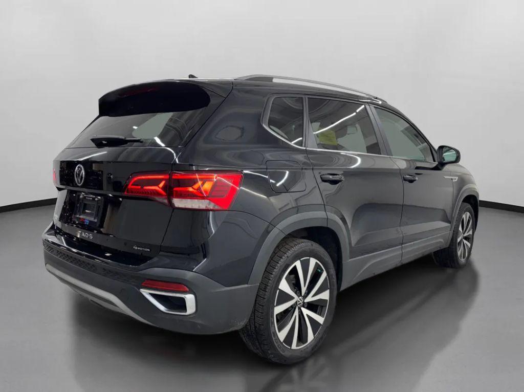 used 2022 Volkswagen Taos car, priced at $14,299