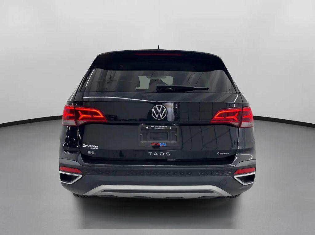 used 2022 Volkswagen Taos car, priced at $14,299