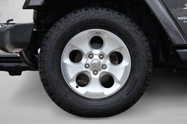 used 2014 Jeep Wrangler Unlimited car, priced at $14,377