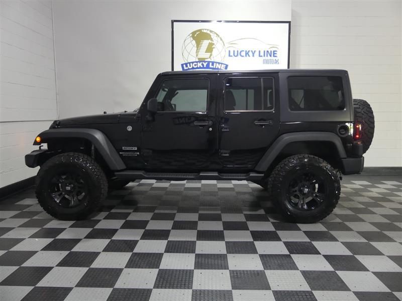 used 2014 Jeep Wrangler Unlimited car, priced at $16,499