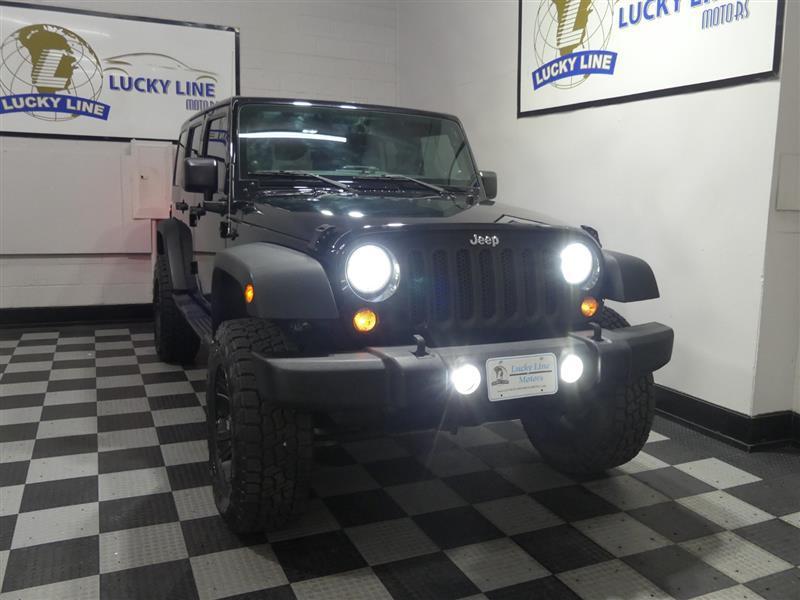 used 2014 Jeep Wrangler Unlimited car, priced at $16,499