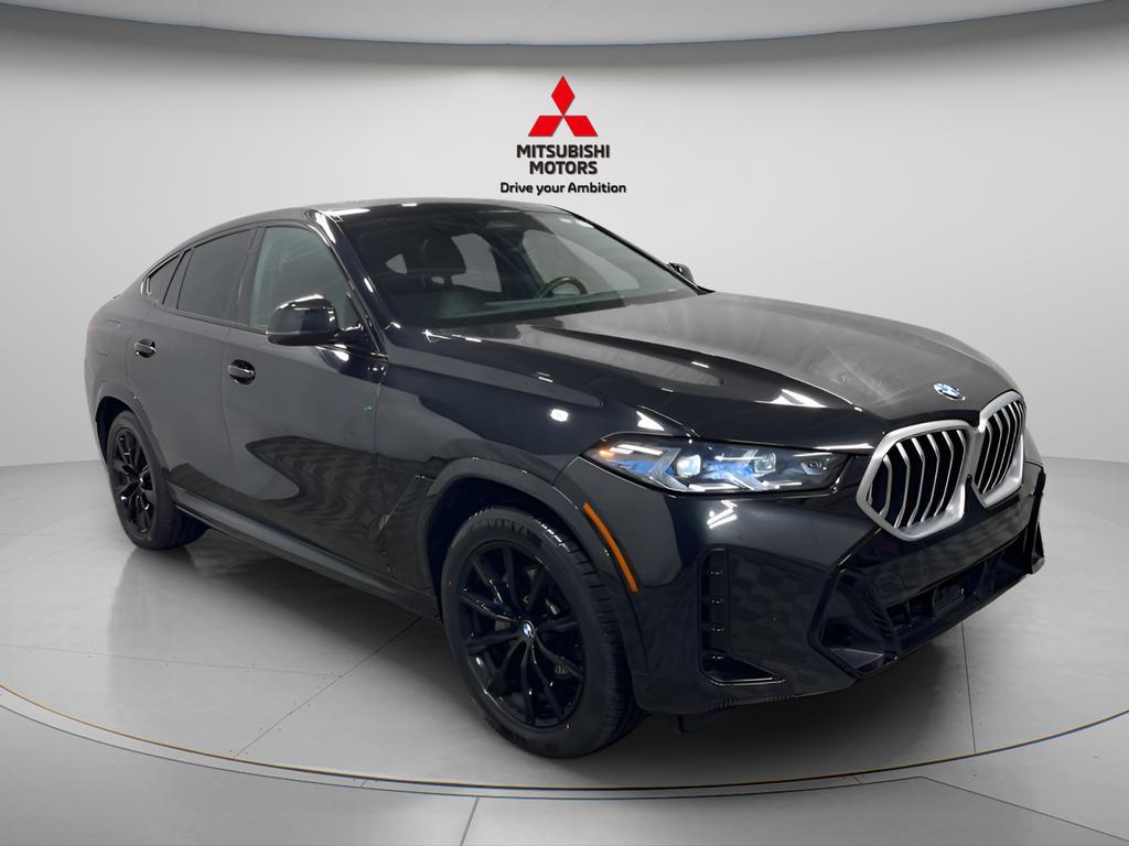 used 2025 BMW X6 car, priced at $53,895
