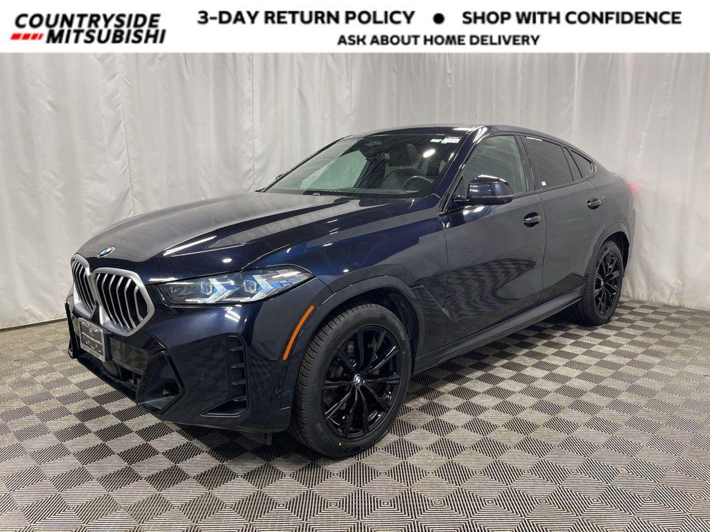 used 2025 BMW X6 car, priced at $55,295