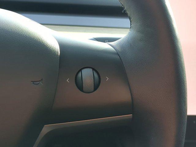 used 2023 Tesla Model 3 car, priced at $21,000