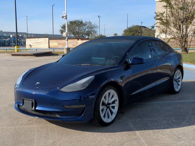 used 2023 Tesla Model 3 car, priced at $21,000