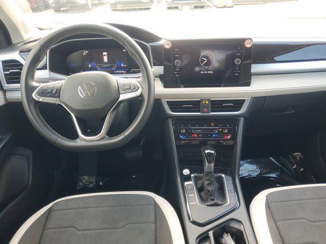 used 2025 Volkswagen Taos car, priced at $24,852