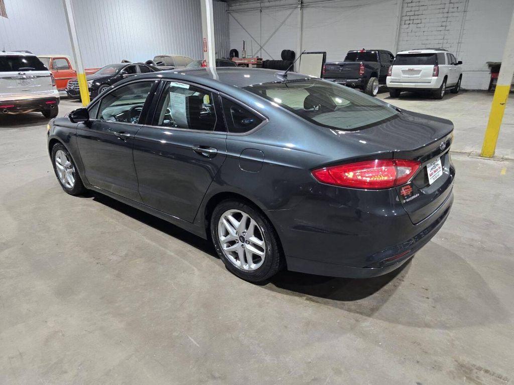 used 2015 Ford Fusion car, priced at $8,900