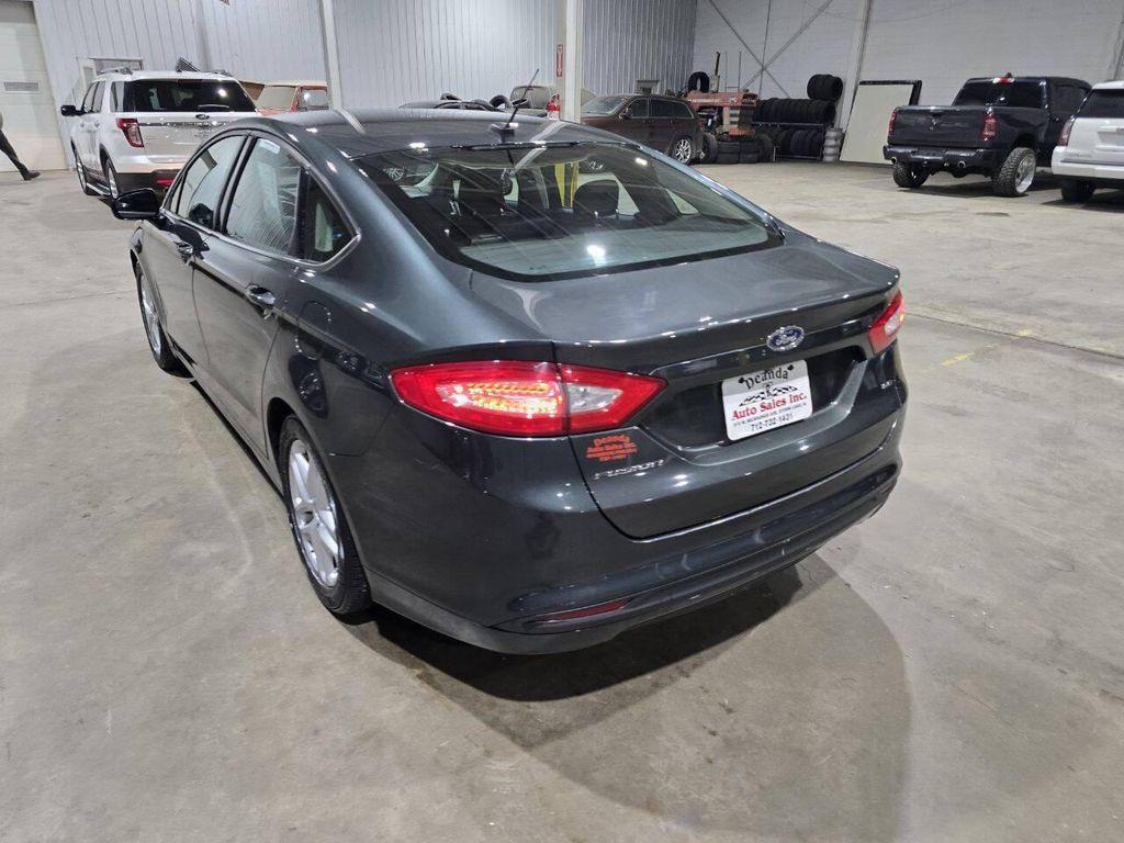 used 2015 Ford Fusion car, priced at $8,900