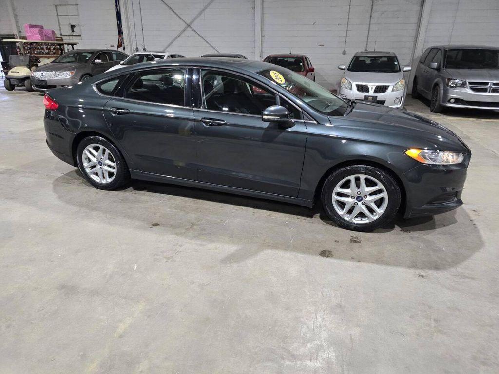 used 2015 Ford Fusion car, priced at $8,900
