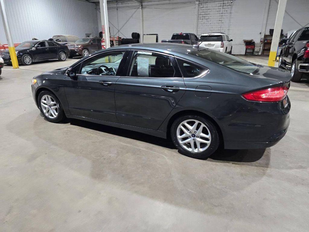 used 2015 Ford Fusion car, priced at $8,900