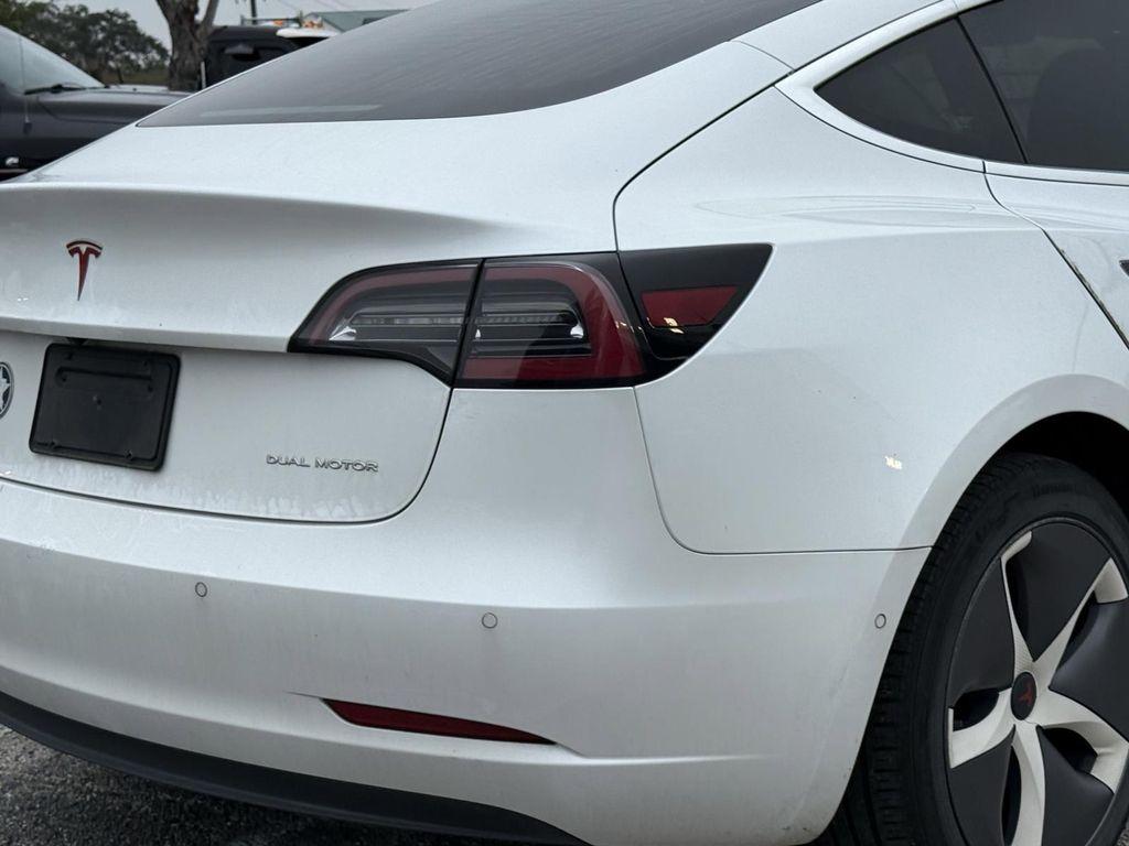 used 2019 Tesla Model 3 car, priced at $23,000