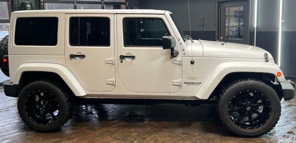 used 2015 Jeep Wrangler Unlimited car, priced at $21,499