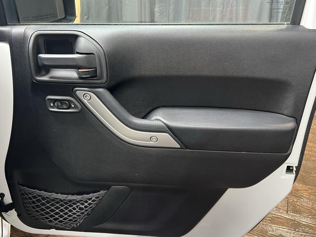 used 2015 Jeep Wrangler Unlimited car, priced at $21,799