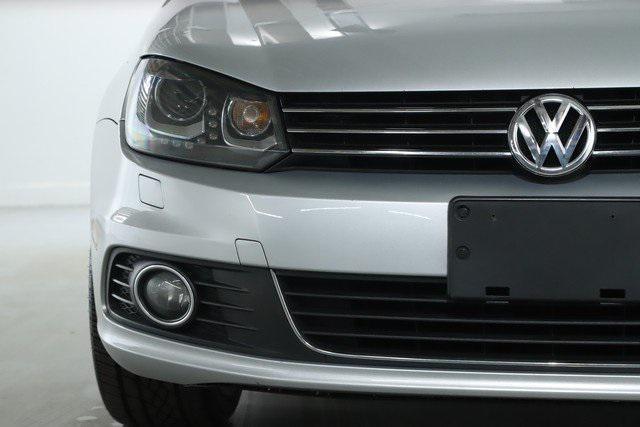 used 2013 Volkswagen Eos car, priced at $9,999