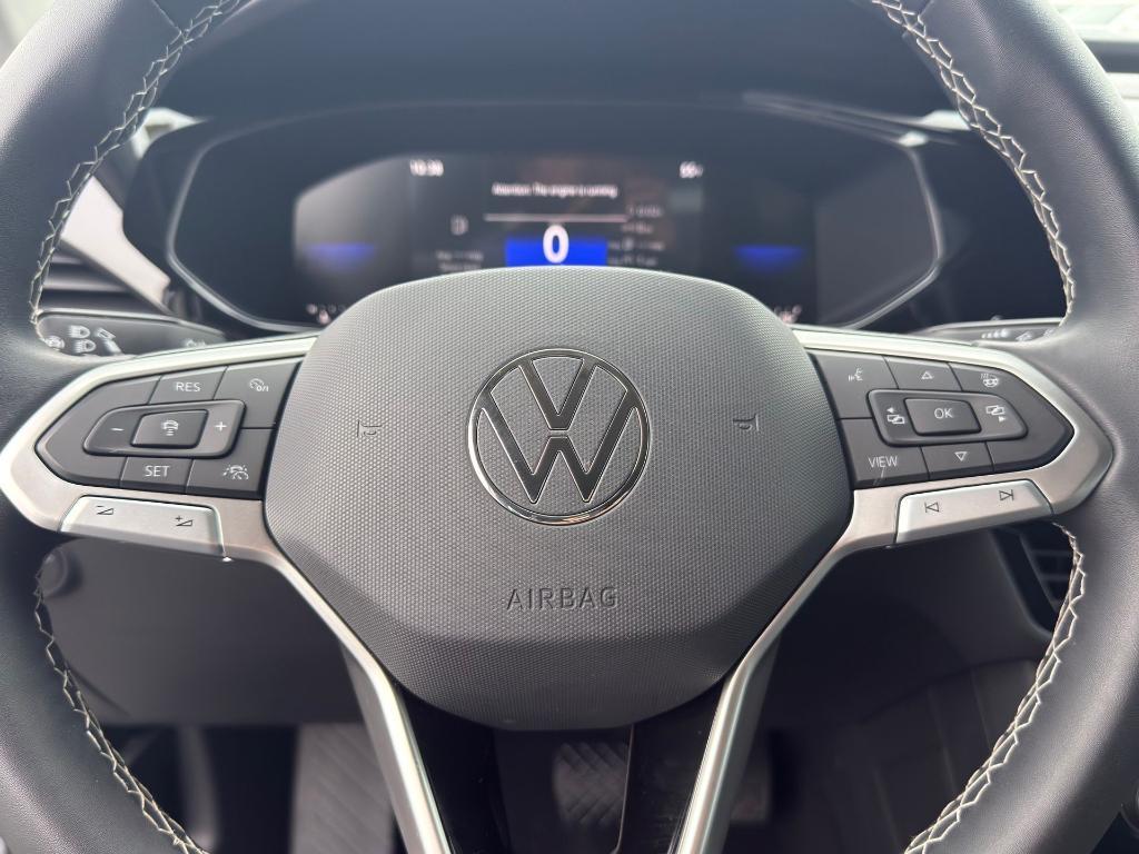 used 2023 Volkswagen Taos car, priced at $19,389