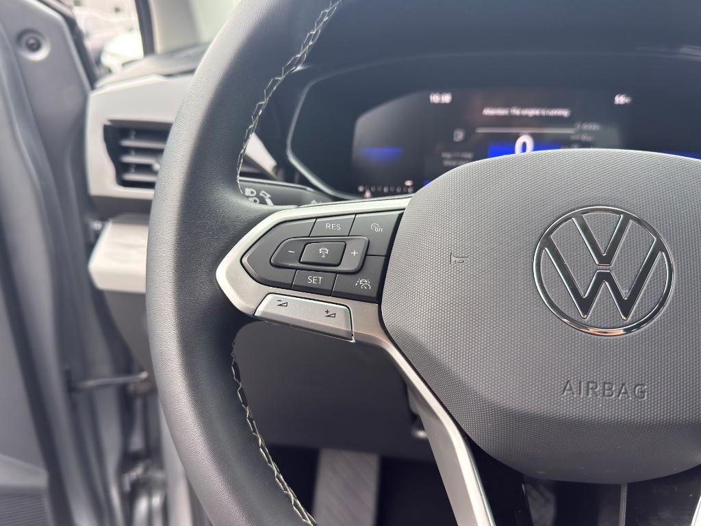 used 2023 Volkswagen Taos car, priced at $19,389
