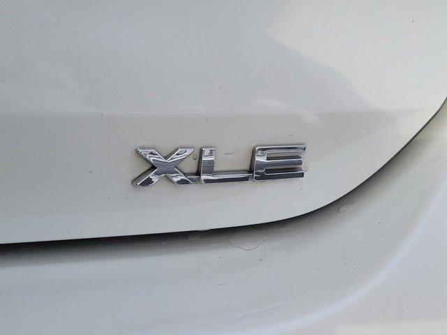 used 2021 Toyota Highlander Hybrid car, priced at $28,838