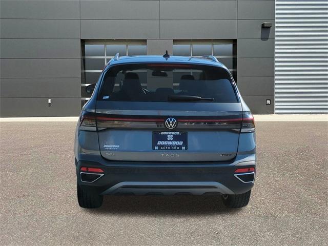 used 2025 Volkswagen Taos car, priced at $27,577