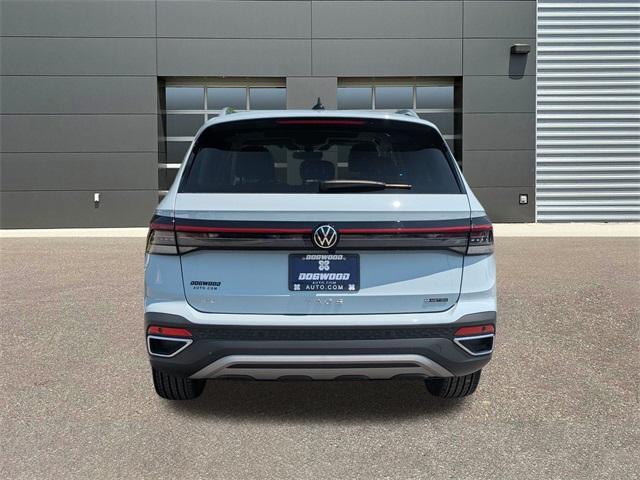 new 2025 Volkswagen Taos car, priced at $30,000