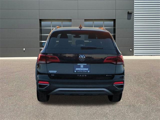 used 2023 Volkswagen Taos car, priced at $19,477