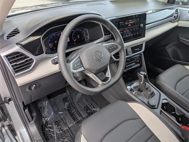 new 2025 Volkswagen Taos car, priced at $28,300