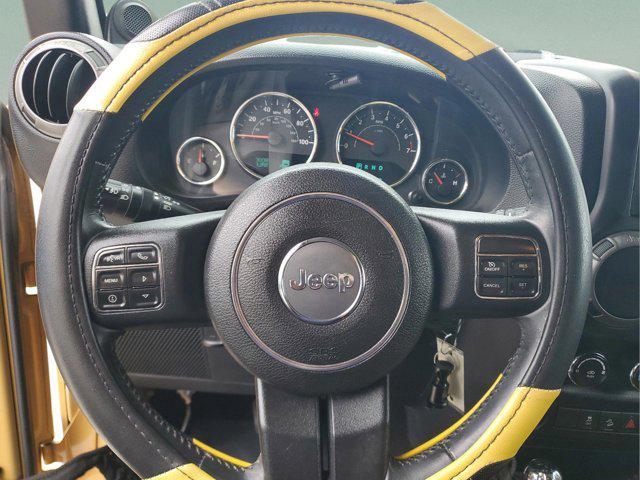 used 2014 Jeep Wrangler Unlimited car, priced at $14,484