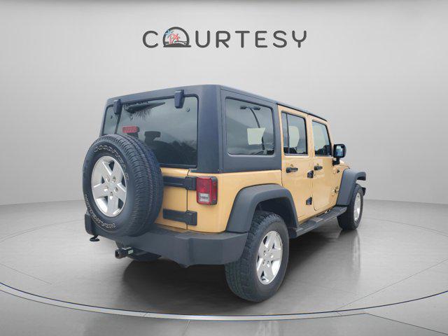 used 2014 Jeep Wrangler Unlimited car, priced at $14,484