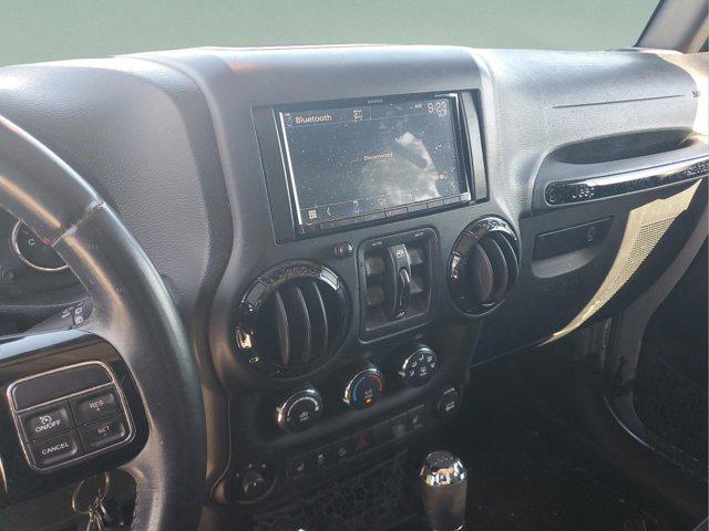 used 2015 Jeep Wrangler Unlimited car, priced at $15,297