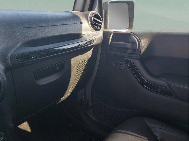 used 2015 Jeep Wrangler Unlimited car, priced at $15,297