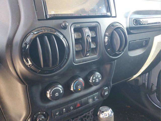 used 2015 Jeep Wrangler Unlimited car, priced at $15,297