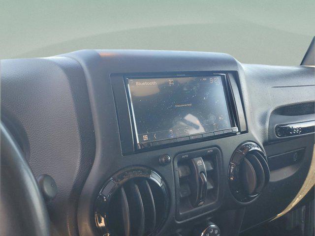 used 2015 Jeep Wrangler Unlimited car, priced at $15,297