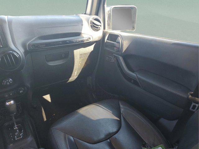 used 2015 Jeep Wrangler Unlimited car, priced at $15,297
