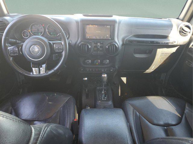 used 2015 Jeep Wrangler Unlimited car, priced at $15,297