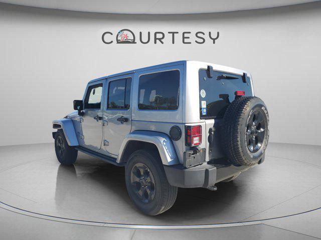 used 2015 Jeep Wrangler Unlimited car, priced at $15,297