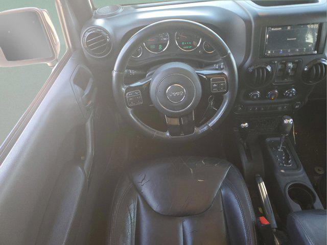 used 2015 Jeep Wrangler Unlimited car, priced at $15,297
