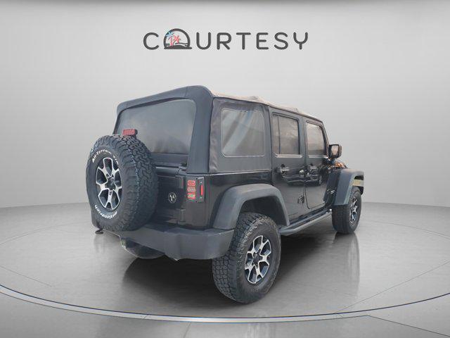 used 2015 Jeep Wrangler Unlimited car, priced at $15,950