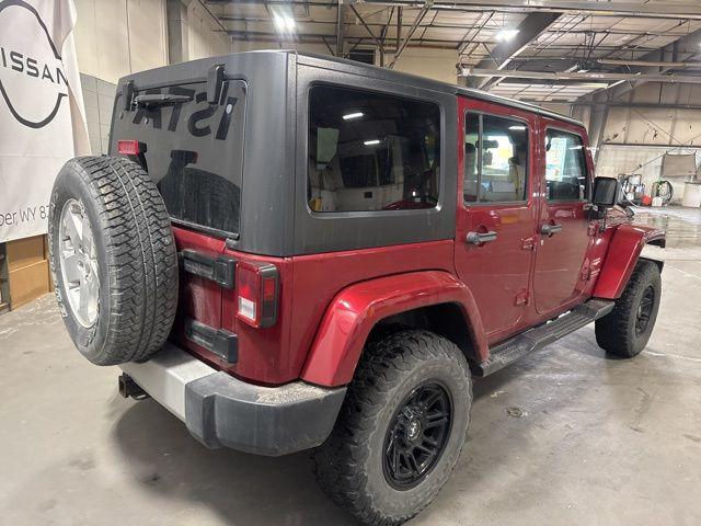 used 2011 Jeep Wrangler Unlimited car, priced at $13,991