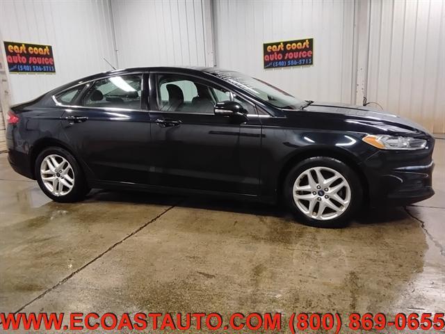 used 2014 Ford Fusion car, priced at $2,995