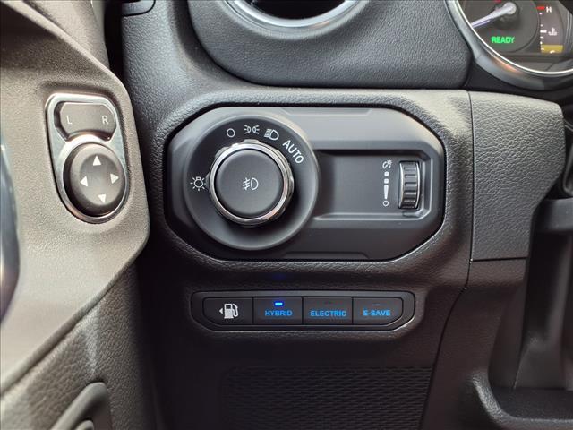used 2023 Jeep Wrangler car, priced at $35,359