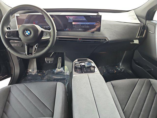 new 2026 BMW iX car, priced at $92,745