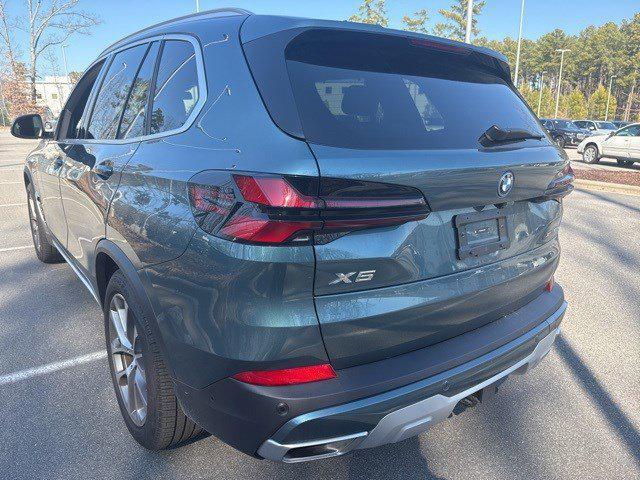 used 2026 BMW X5 PHEV car, priced at $76,991