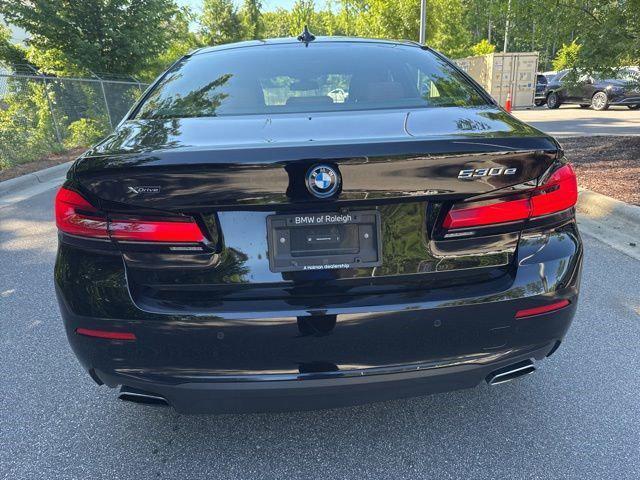 used 2023 BMW 530e car, priced at $34,479