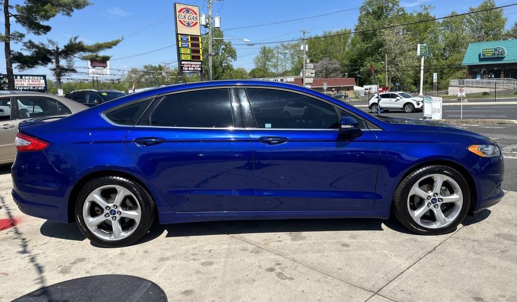 used 2015 Ford Fusion car, priced at $5,799