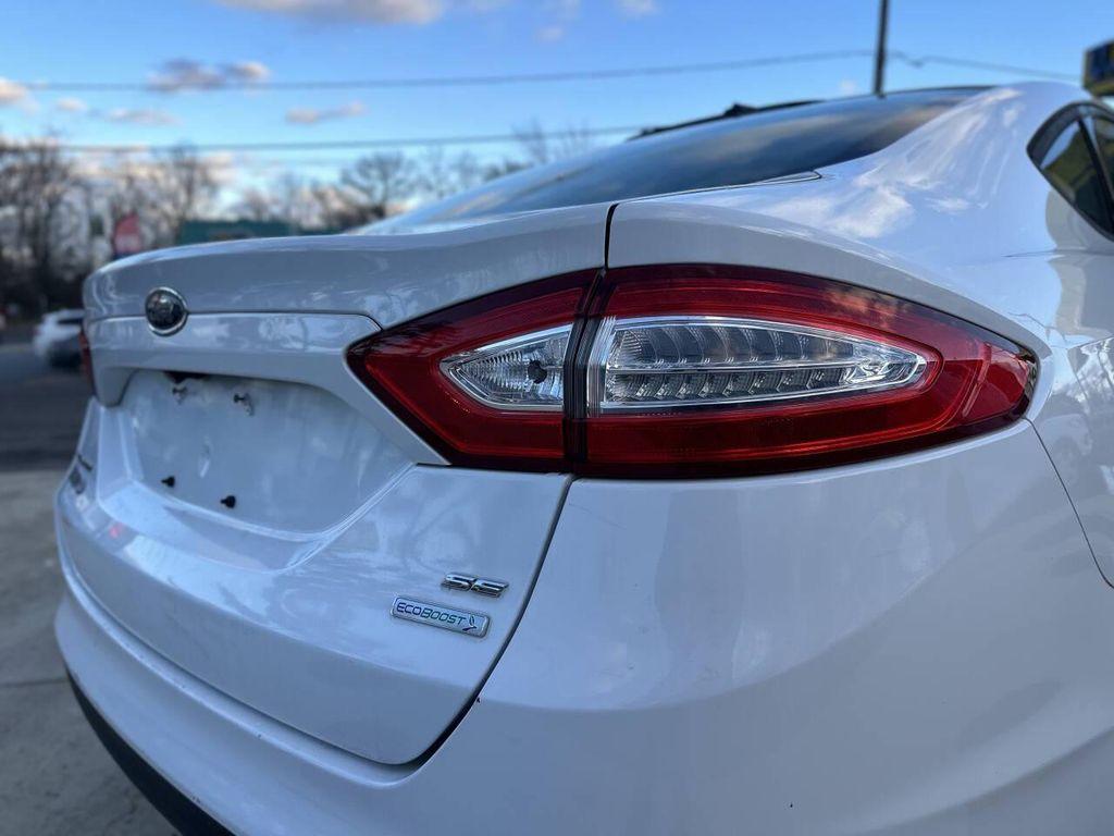 used 2013 Ford Fusion car, priced at $5,999