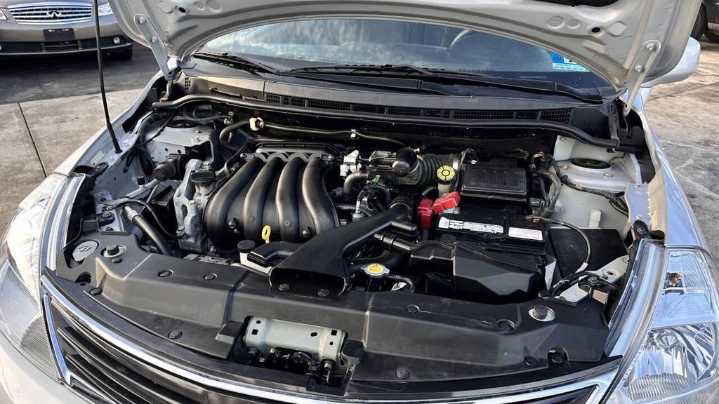 used 2012 Nissan Versa car, priced at $7,999