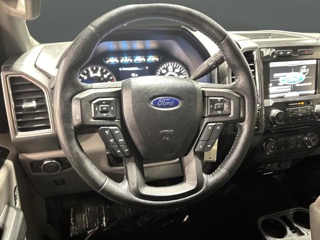 used 2015 Ford F-150 car, priced at $14,000