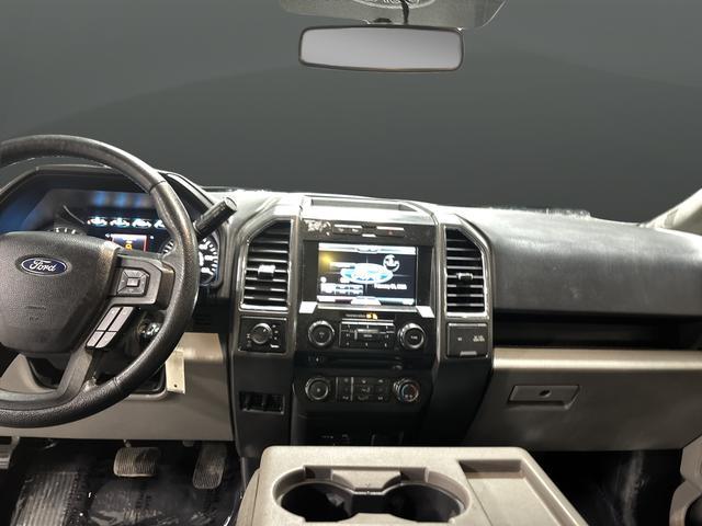 used 2015 Ford F-150 car, priced at $14,000