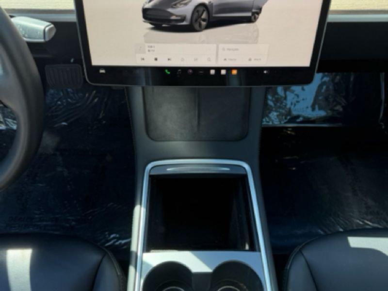 used 2023 Tesla Model 3 car, priced at $29,491